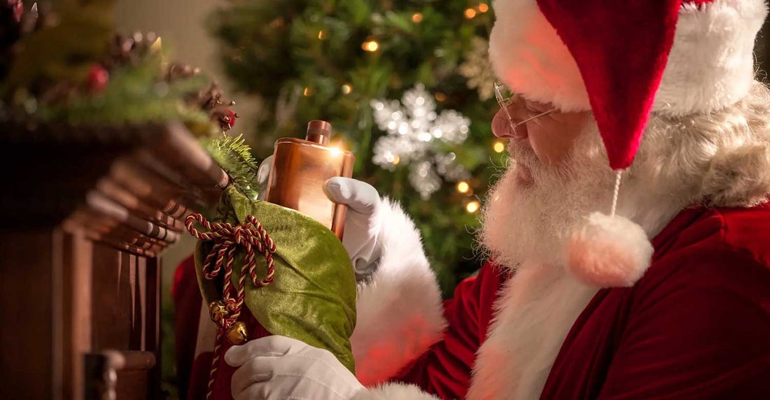 Santa holding Jacob Bromwell Flask
